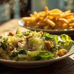 caesar salad and fries